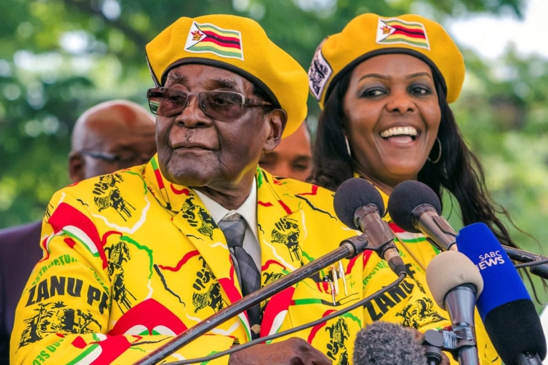 Zimbabwe's President Robert Mugabe (left) is likely facing the end of his iron-fisted reign, with a military takeover of the southern African nation on Wednesday. Earlier in November, he dismissed his Vice-President, a move that many saw as paving the way for his wife Grace (right) to run the country when he dies or steps down. Photo: AFP