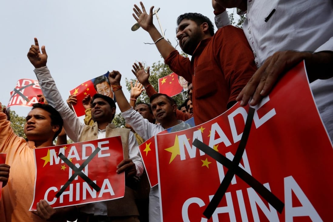 Indian demonstrators demand the boycott of Chinese products in New Delhi. Photo: Reuters