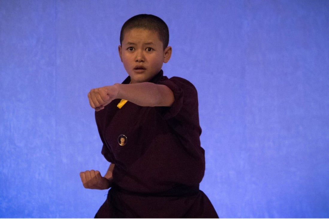 Jigme Wangchuk Llhamo, a 19-year-old Buddhist nun, performs at the Trust Conference in London. Photo: Thomson Reuters Foundation