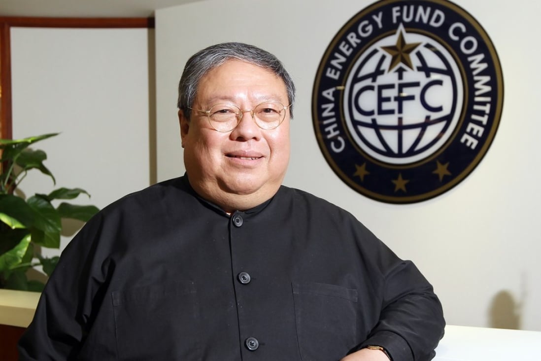 Former Hong Kong Secretary for Home Affairs Patrick Ho Chi-ping poses for a photo at the Hong Kong offices of the China Energy Fund Committee in Wan Chai. Photo: SCMP