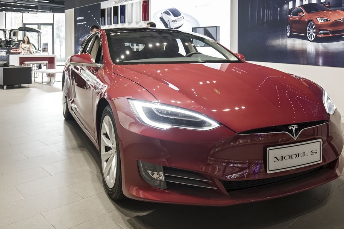 A Tesla Model S. A Hong Kong property developer is giving away a free Tesla to buyers of its upmarket flats in the city’s Kai Tak area. Photo: Bloomberg