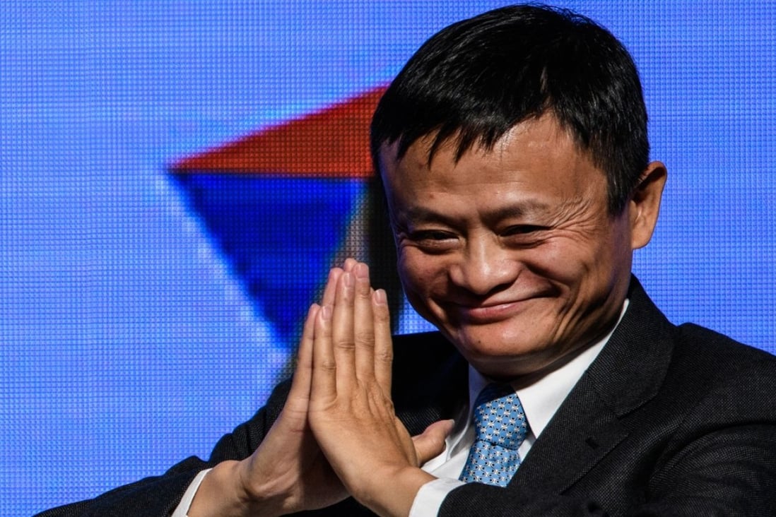 Alibaba Group Executive Chairman Jack Ma gestures during the JUMPSTARTER 2017 Grand Finale in Hong Kong on November 21, 2017. The event is aimed at encouraging and boosting the Hong Kong startup community. / AFP PHOTO / Anthony WALLACE