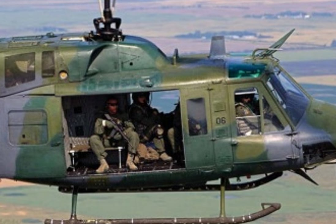 A helicopter with a Star Safire III infrared camera mounted on its nose. The camera is manufactured by Oregon-based FLIR Systems Inc. and is used extensively by the US military as a long-range thermal imager and ultra long-range spotter scope. Photo: FLIR Systems