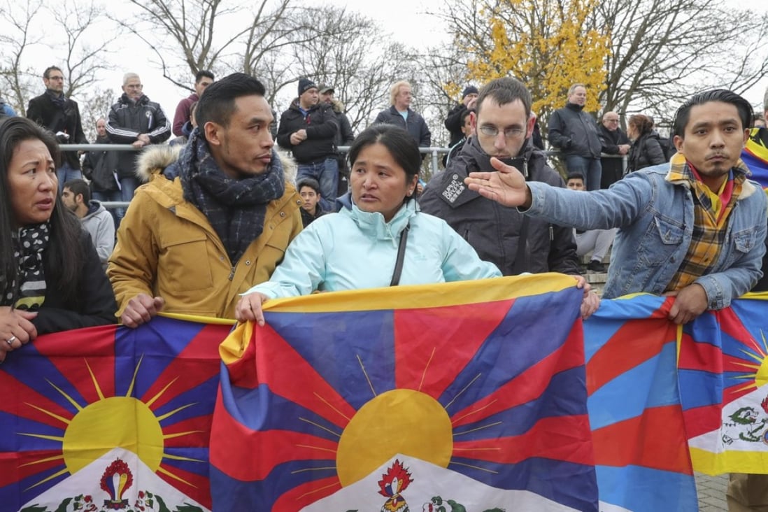 Tibetan protester unfurled the flag at a game in Mainz, Germany earlier this month. Photo: EPA-EFE