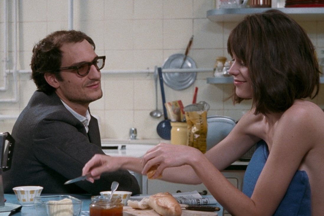 Louis Garrel as Jean-Luc Godard and Stacy Martin as Anne Wiazemsky in Redoubtable (category IIB, French), directed by Michel Hazanavicius.