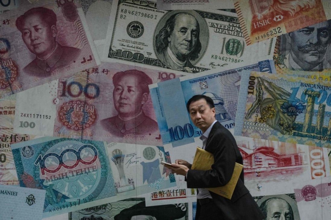 A display in Hong Kong showing different banknotes. Photo: AFP