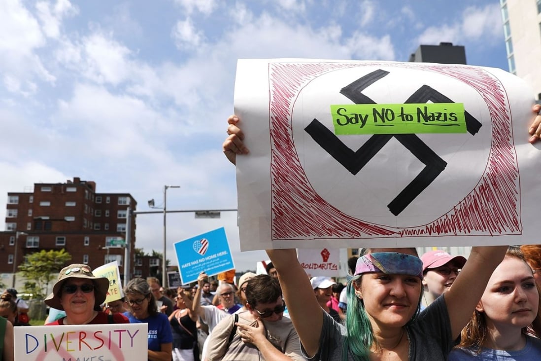 Thousands of protesters march in Boston in August against a planned “Free Speech Rally” one week after the violent “Unite the Right” rally in Virginia left one woman dead and dozens more injured. Photo: AFP