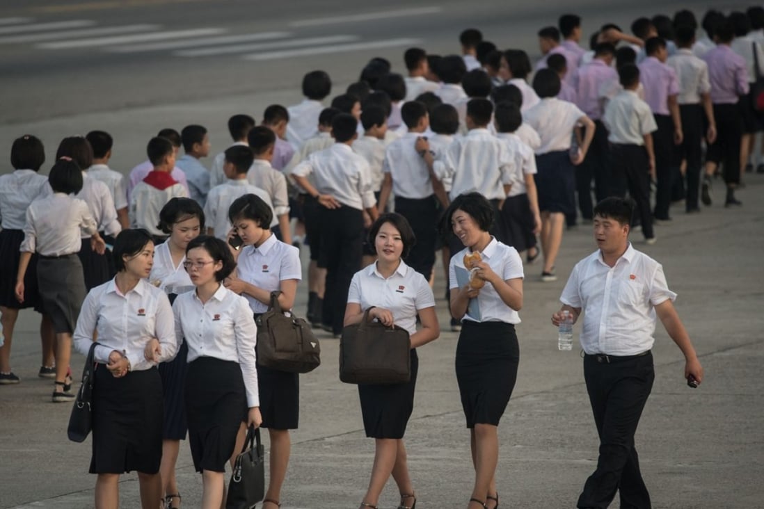 North Korean students pictured in a street in Pyongyang. The exchange programme allows 60 North Korean and 60 Chinese students to spent seven months in the respective countries. Photo: AFP
