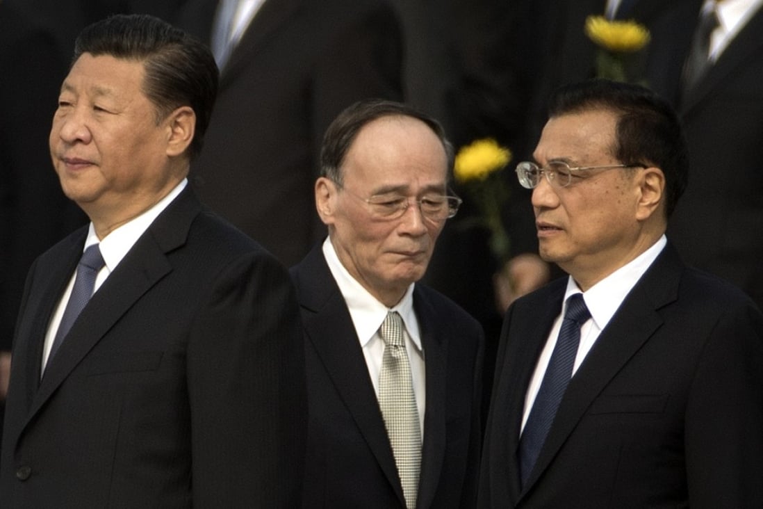 (From left) President Xi Jinping, Wang Qishan and Premier Li Keqiang at a ceremony marking Martyrs' Day at Tiananmen Square in Beijing in September. Photo: AP