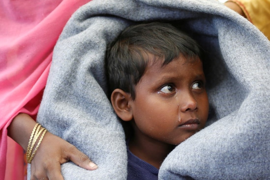 A Rohingya refugee boy on the way to Cox’s Bazar, Bangladesh. Photo: Reuters
