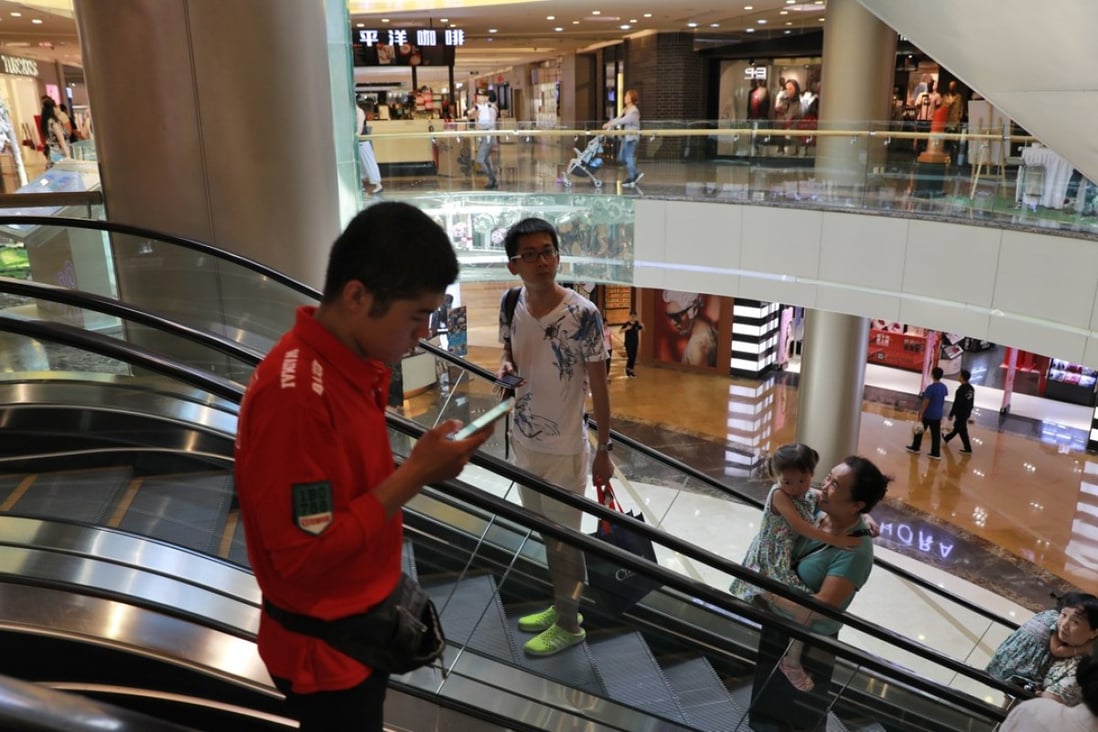 A shopping centre in Beijing. Singapore mall developer CapitaLand is launching a new app as it looks to stay ahead of the competition for the Chinese consumer’s dollar. Photo: EPA