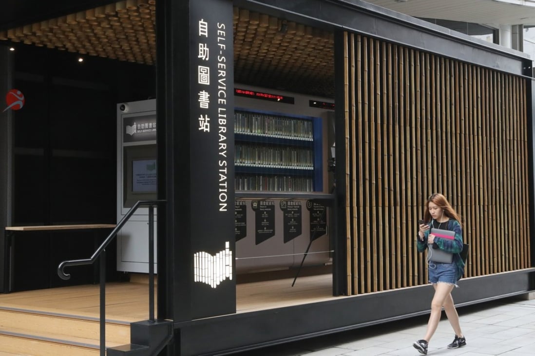 Readers can borrow from 300 books on the shelves of the vending machine-style station located at Sai Wan Ho. Photo: K.Y. Cheng