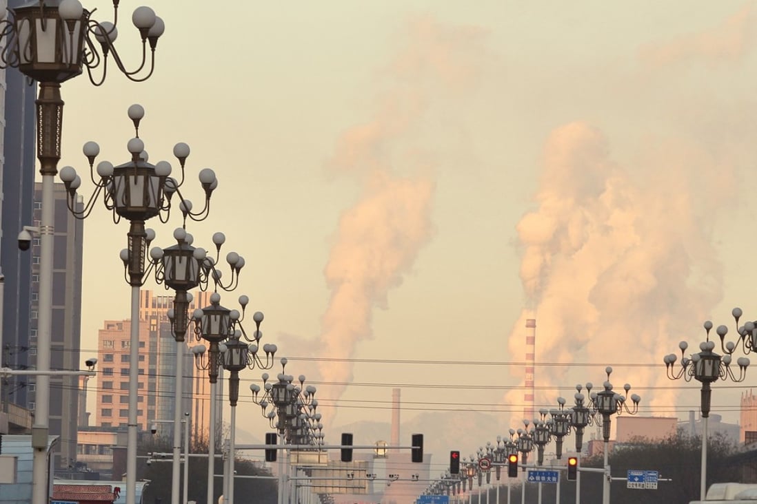 Smoke pours from industrial plants in Iron and Steel Street in Baotou in Inner Mongolia. Photo: Simon Song