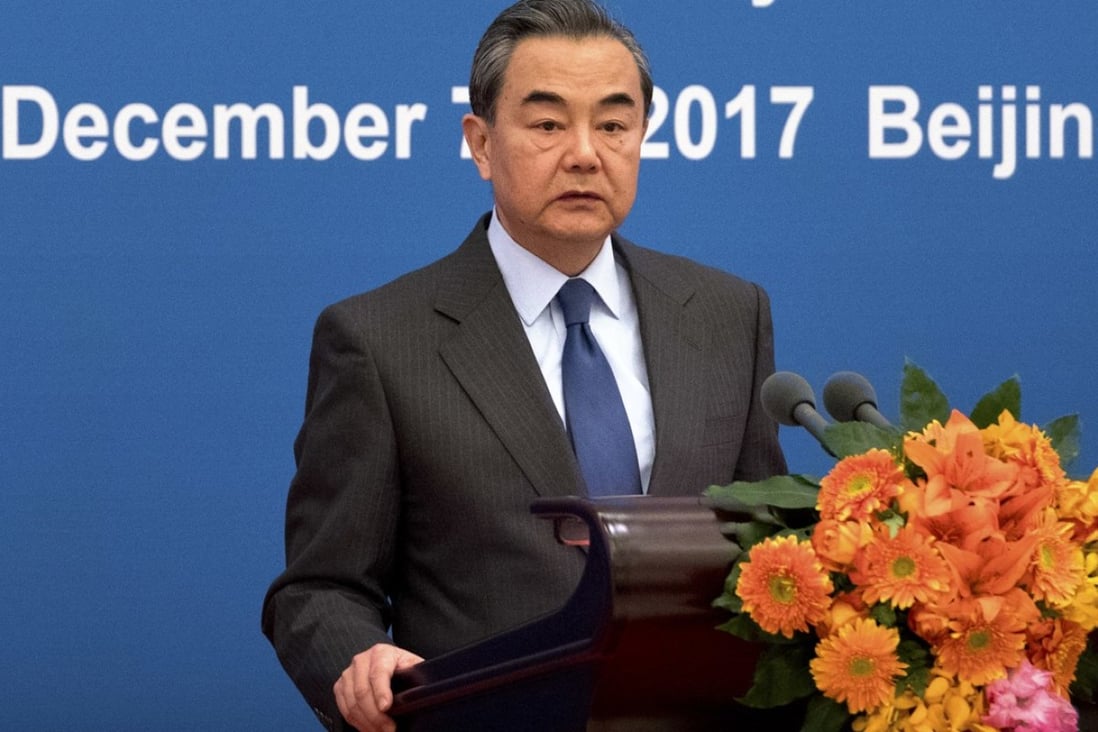 Chinese Foreign Minister Wang Yi addresses the opening session of the forum on Thursday. Photo: AP