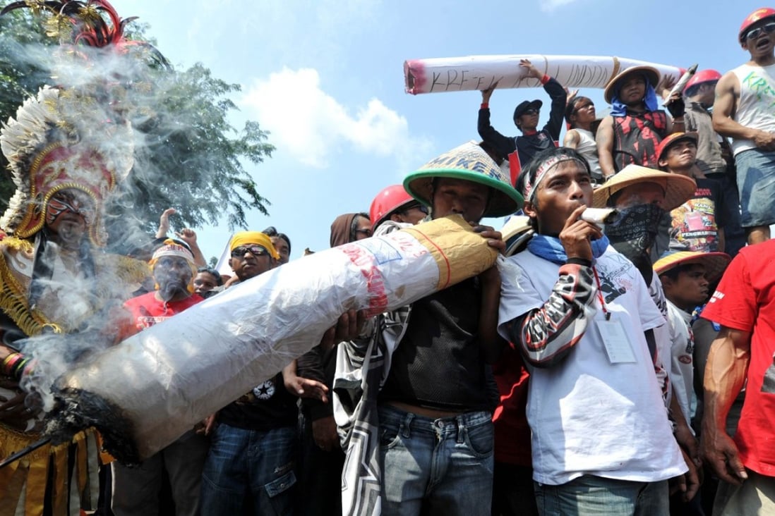 Indonesian tobacco farmers protest against plans to restrict tobacco use. Photo: AFP