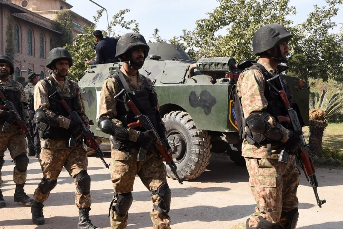 Pakistani soldiers in Peshawar after an attack by Taliban militants on December 1. The Chinese embassy says it has been informed that terrorists are planning “a series of attacks soon” against Chinese. Photo: AFP