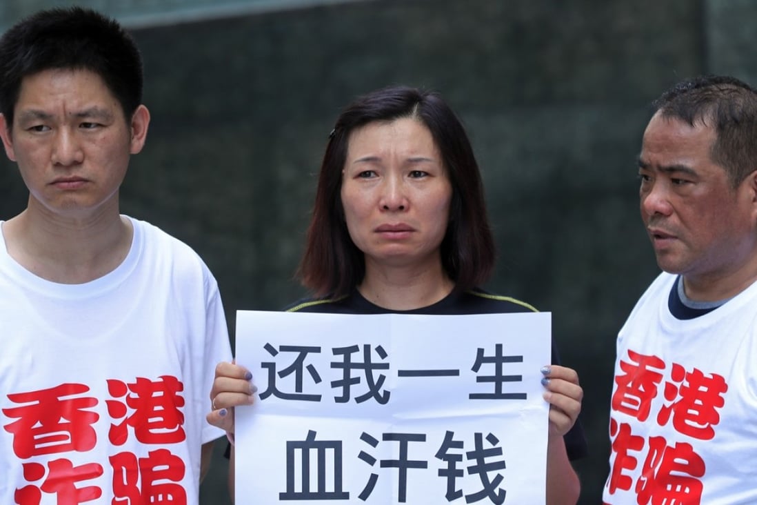 Mainland investors complain to Hong Kong’s Securities and Futures Commission and the Hong Kong Monetary Authority as they lost all money after being lured into buying financial products worth US$10 billion through a Hong Kong broker.24 June 2016. Photo: SCMP/ Edward Wong
