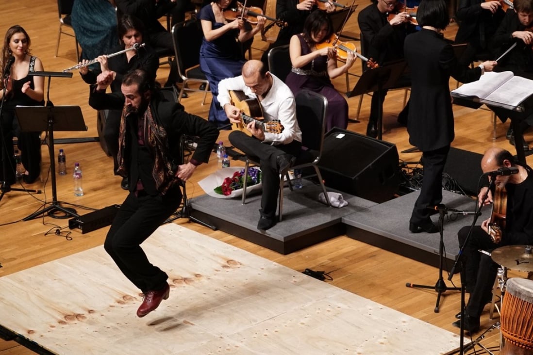 Sergio Aranda (foreground) and Juan Carmona (centre) perform Sinfonia Flamenca with the City Chamber Orchestra of Hong Kong at Sha Tin Town Hall.
