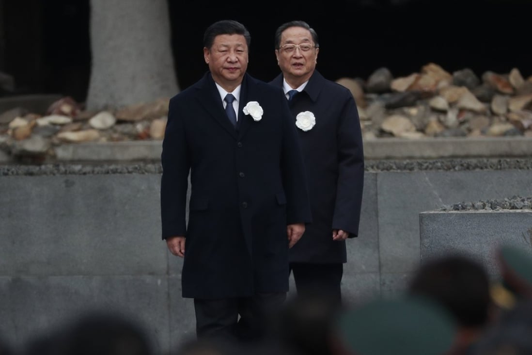 Chinese President Xi Jinping (left) and Chinese People's Political Consultative Conference chairman Yu Zhengsheng attend commemorations in Nanjing on Wednesday, the 80th anniversary of the Nanking massacre. Photo: EPA