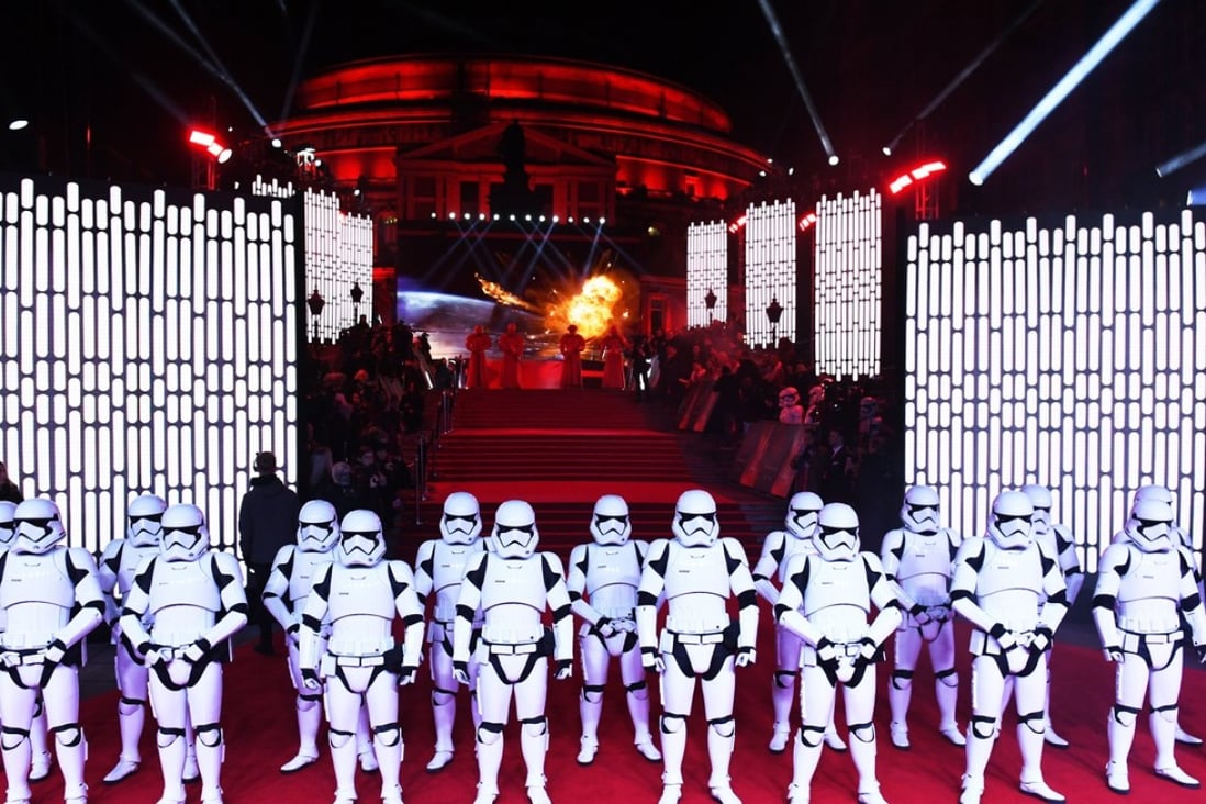 Actors dressed at storm trooper characters pose at the UK Premiere of 'Star Wars: The Last Jedi' at the Royal Albert Hall in London. The film franchise is a key part of Disney’s corporate strategy. Photo: EPA-EFE