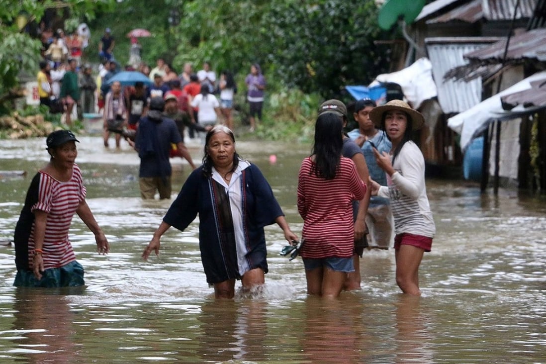 Three dead, thousands flee as tropical storm Kai-Tak pounds central ...