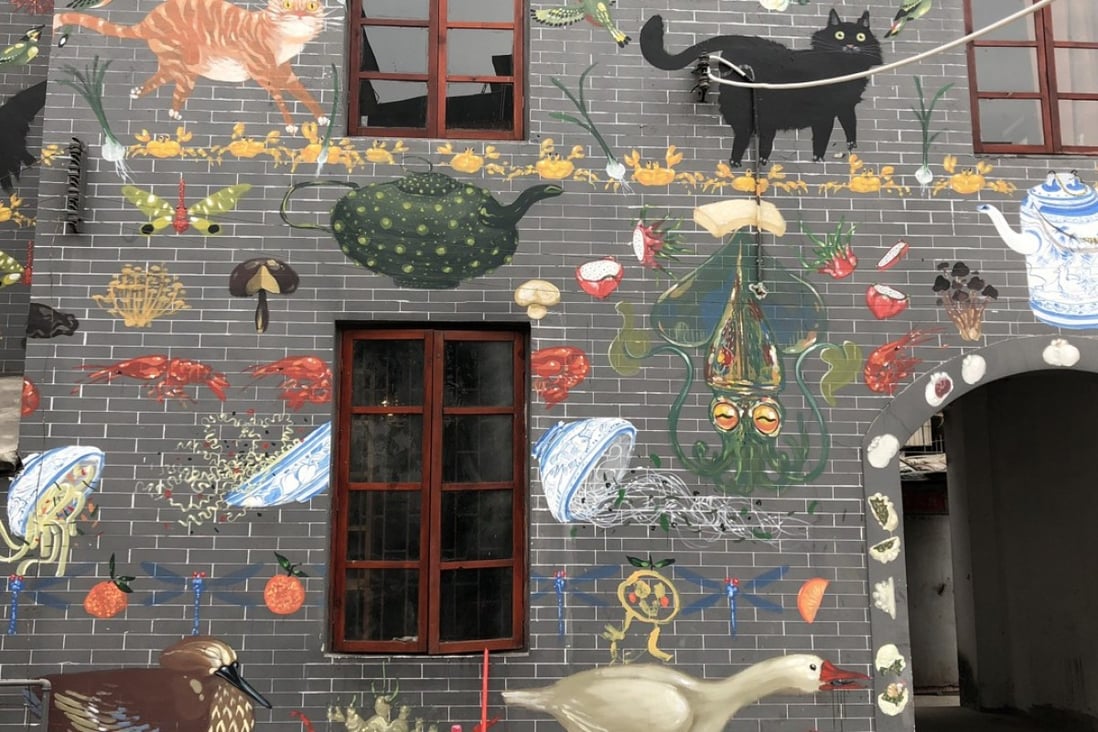 A mural covers a restored building in Nantou’s old town, the focus of the Shenzhen half of the 10th Bi-city Biennale of Urbanism/Architecture. Photo: Enid Tsui