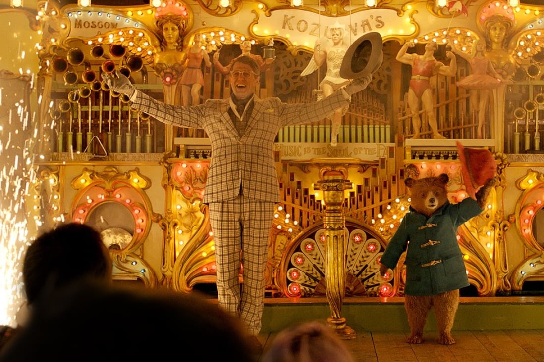 Hugh Grant and Paddington, the lovable Peruvian bear, in Paddington 2 (category: I), directed by Paul King.