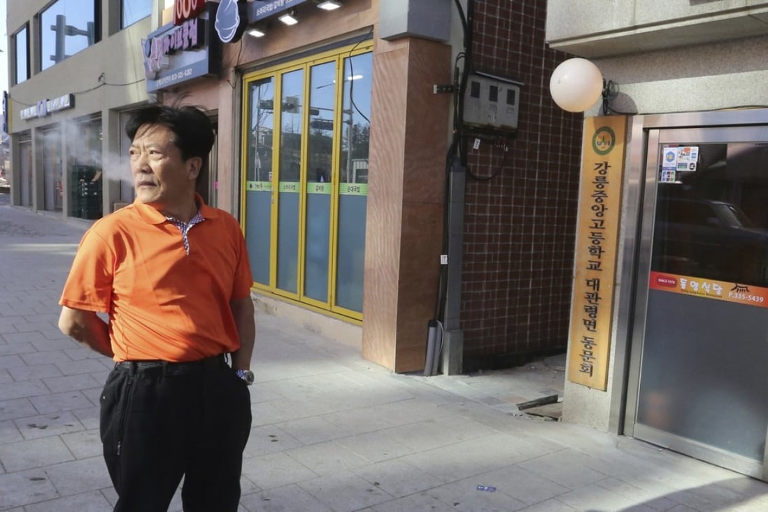 Choi Jong-sik, 64, stands in front of his restaurant in Pyeongchang, South Korea. After two straight balmy Olympics where some might have wondered if it was even winter, let alone the world’s pre-eminent freeze-dependent sporting event, athletes and visitors alike will finally experience a no-joke chill in their bones in Pyeongchang. Photo: AP