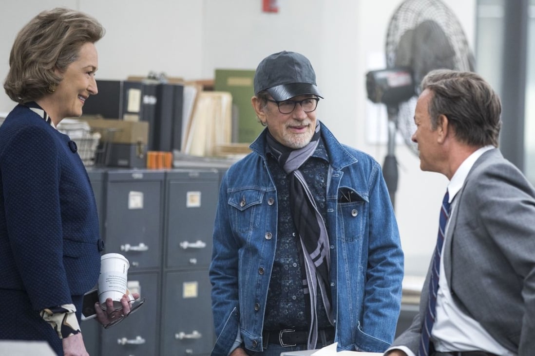 Meryl Streep, director Steven Spielberg, and Tom Hanks discuss a scene on the set of The Post. Photo: AP