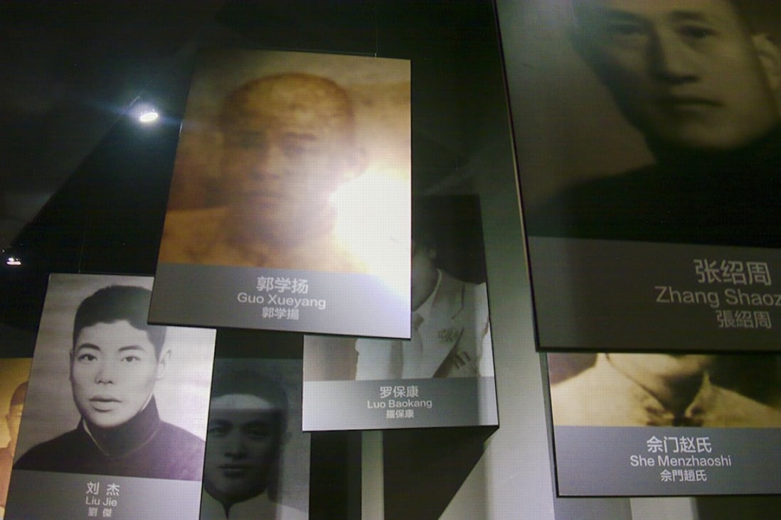 Photographs of victims are displayed at the Nanking massacre memorial. Picture: Stuart Heaver
