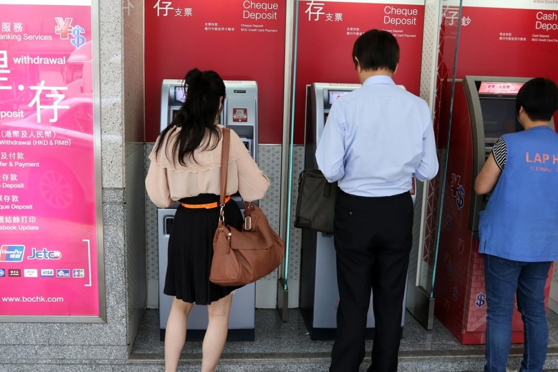 China has set new limits on the amount of cash bank customers are allowed to withdraw while overseas. Photo: Martin Chan