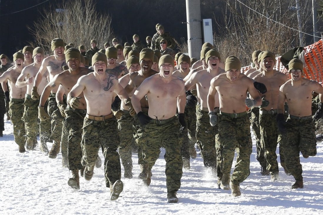 US Marines run at a joint military winter exercise with South Korean marines in Pyeongchang, South Korea. Photo: AP