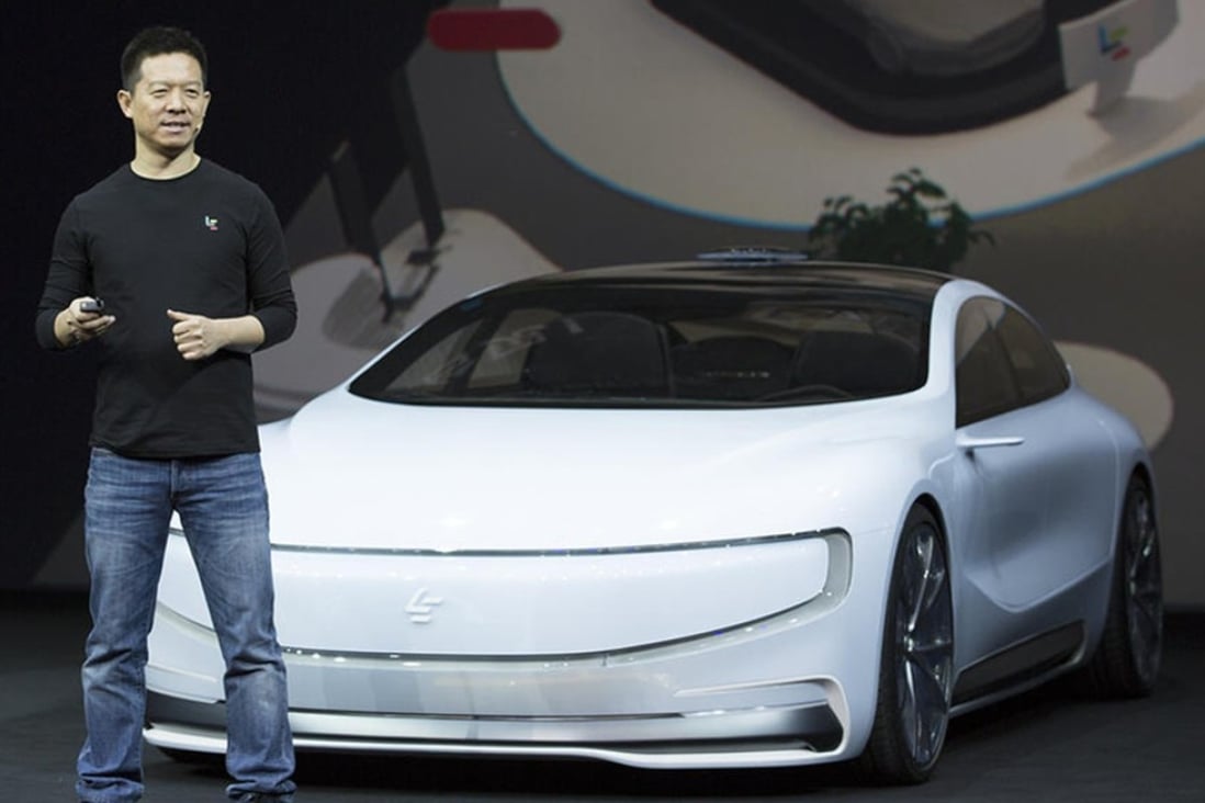 Jia Yueting, co-founder of LeEco, seen unveiling an all-electric battery concept car during a ceremony in Beijing on April 20, 2016. Photo: Handout