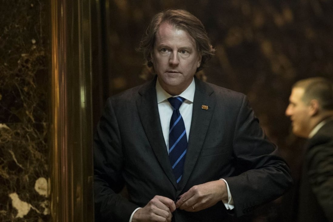 Lawyer Don McGahn exits an elevator in the lobby at Trump Tower on November 15, 2016. Photo: Agence France-Presse