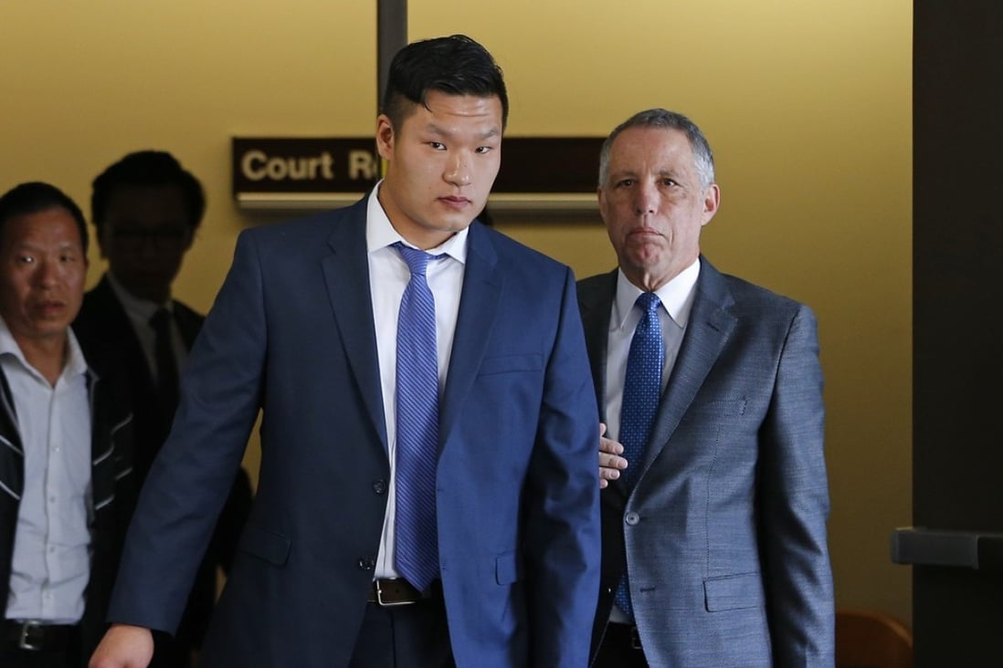 Raymond Lam (centre, seen in May last year) has pleaded guilty to voluntary manslaughter in the death of Michael Chun Deng, a fraternity pledge at Baruch College in New York. Deng died during a hazing ritual at a home in Pennsylvania that was rented by his fraternity, Pi Delta Psi. On Monday he was sentenced to 10-24 months in jail. File photo: AP
