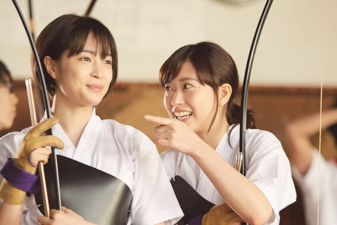 Suzu Hirose (left) in a still from My Teacher (category IIA; Japanese)), directed by Takahiro Miki. Toma Ikuta and Manami Higa co-star.