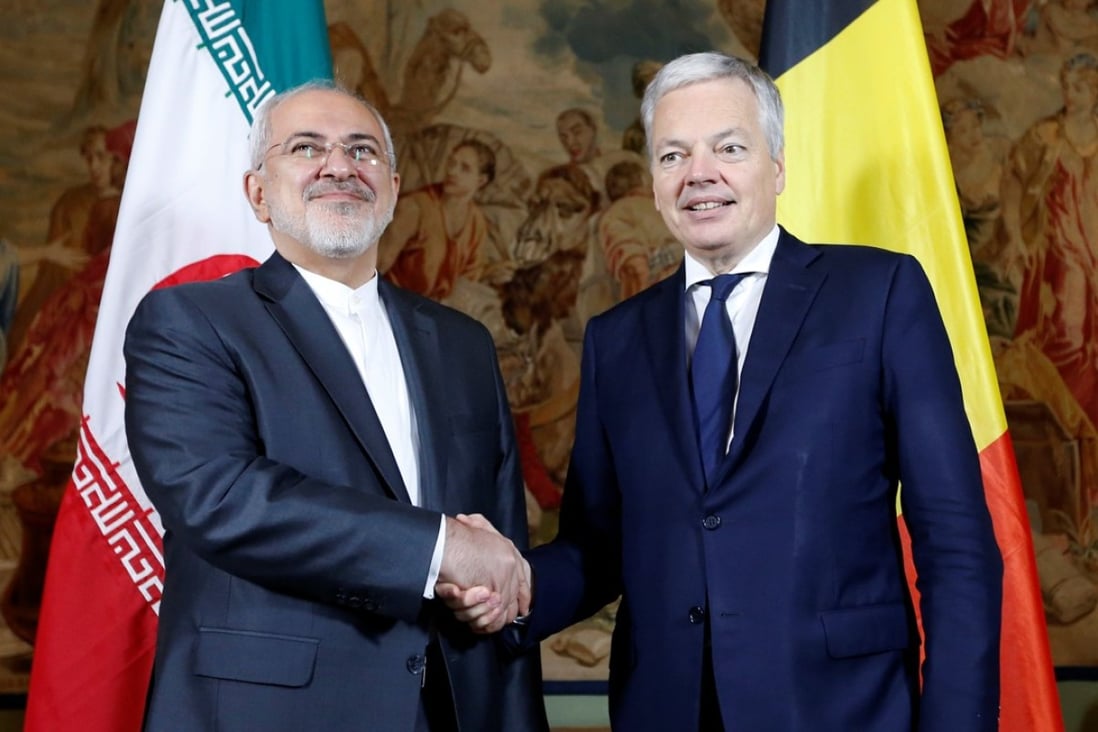 Belgian Foreign Minister Didier Reynders with his Iranian counterpart, Mohammad Javad Zarif. Photo: Reuters
