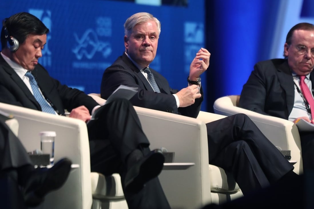Deutsche Bundesbank board member Andreas Dombret (centre) at the Asian Financial Forum in Hong Kong on Monday with China Development Bank chairman Hu Huaibang (left) and HSBC chief executive Stuart Gulliver. Photo: Jonathan Wong