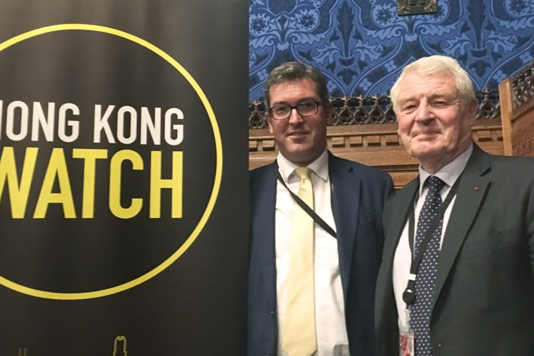 British peer Paddy Ashdown (right, with human rights activist Benedict Rogers) says those eligible for BNO passports should make sure they claim them. Photo: Stuart Lau
