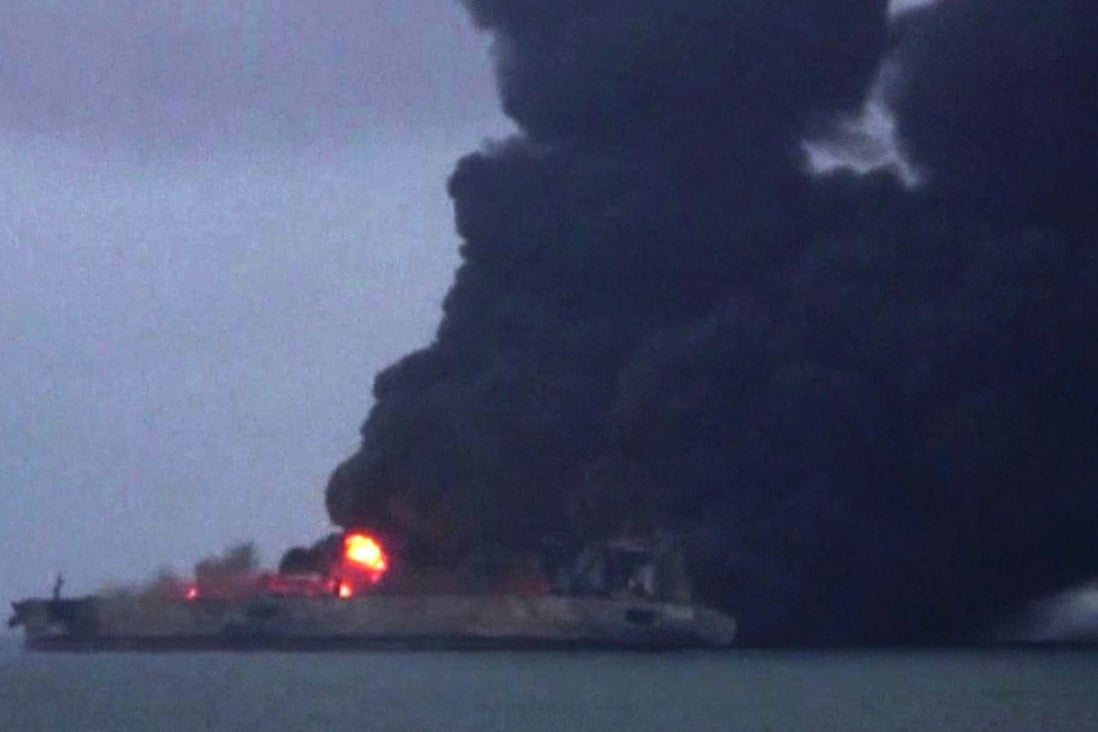The body of a missing crew member has been found on board the burning tanker in the East China Sea. Photo: AFP