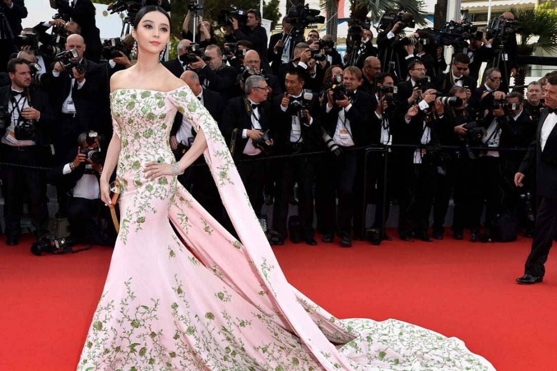 Fan Bingbing attends a red carpet event at the 68th annual Cannes Film Festival. Styled by Min Rui. Photo: Pascal Le Segretain
