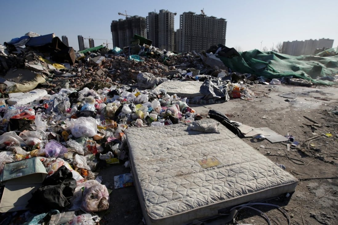 New homes under construction near demolished low-cost dwellings in Beijing’s Tongzhou district. The government is seeking to ease the processes for non-property firms to build affordable homes on land they hold. Photo: Reuters