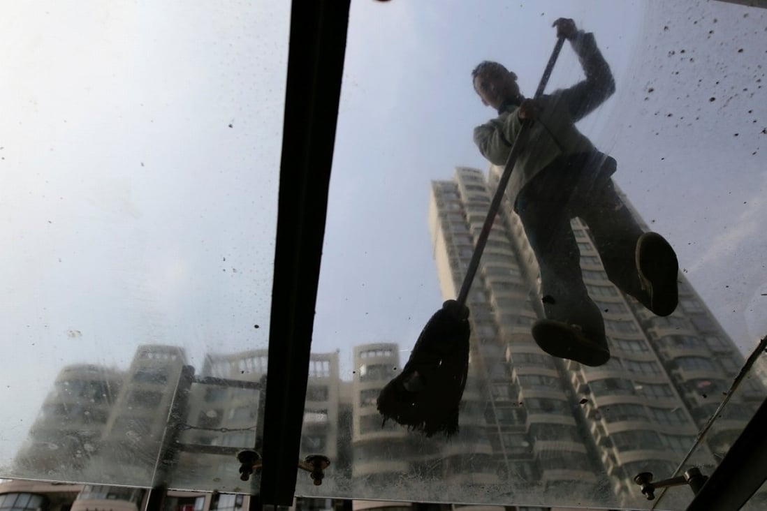 The expenses for a property management team with a portfolio of five buildings could exceed HK$400,000 a month. Photo: Reuters
