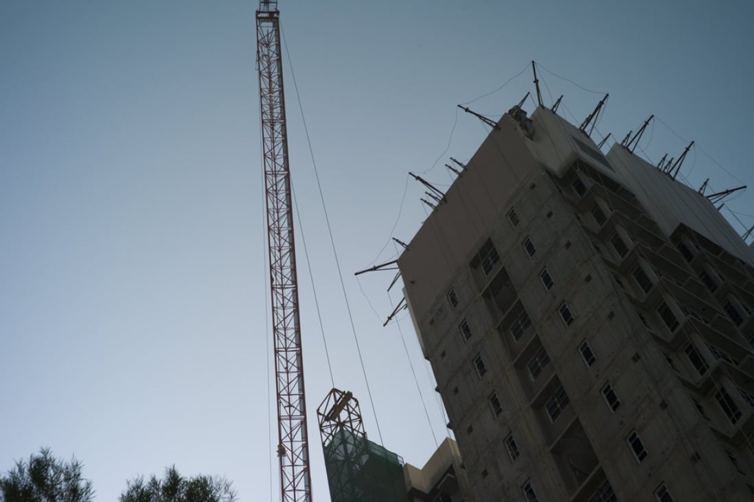 Residential units being built in Hong Kong. Housing starts in the city tumbled last year. Photo: EPA