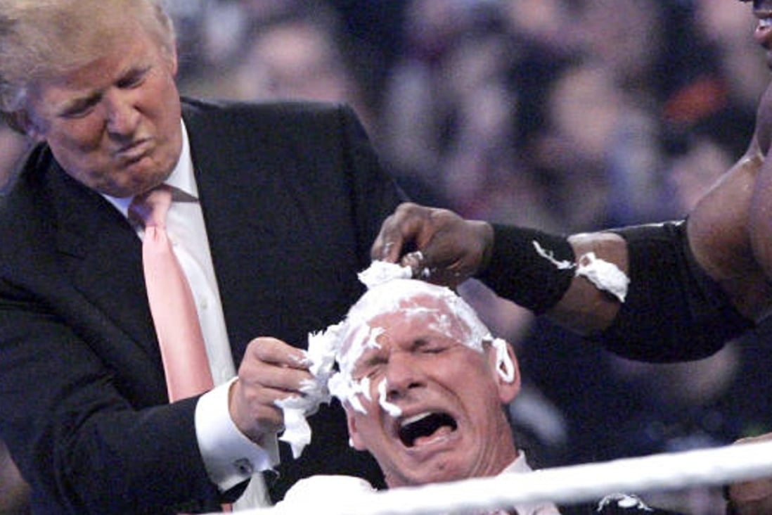 Donald Trump (left) and wrestler Bobby Lashley shave WWE owner Vince McMahon’s head at WrestleMania 23 in 2007. Photo: AP