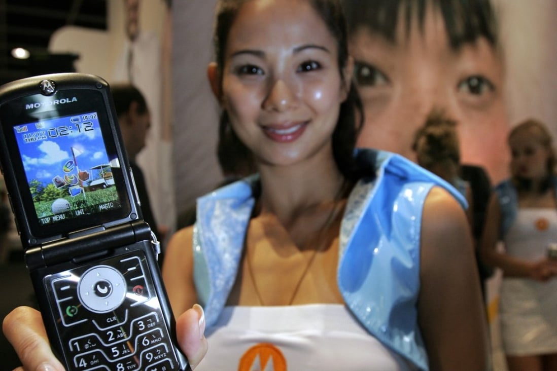 A Motorola Razr V3c handset during the 3G World Congress & Exhibition 2005 at the Hong Kong Convention and Exhibition Centre. Motorola gave Biel Crystal its first big break, using touch-sensitive glass to replace plastic screens. From there, Biel went on to supply glass for smartphones made by Apple, Samsung and other brands, and is today the world’s dominant producer of smartphone glass covers. Photo: SCMP/Handout