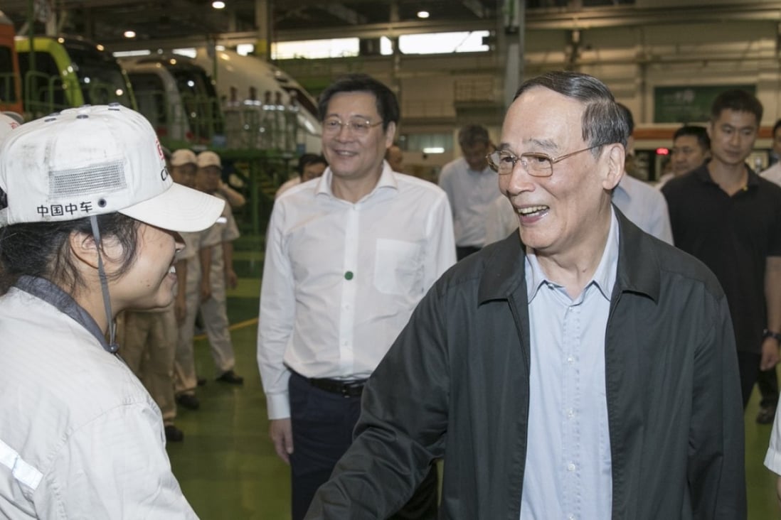 In his first public appearance after the annual Beidaihe conclave, Wang Qishan visits CRRC Zhuzhou Locomotive in Hunan in September while still the anticorruption tsar. Photo: Xinhua