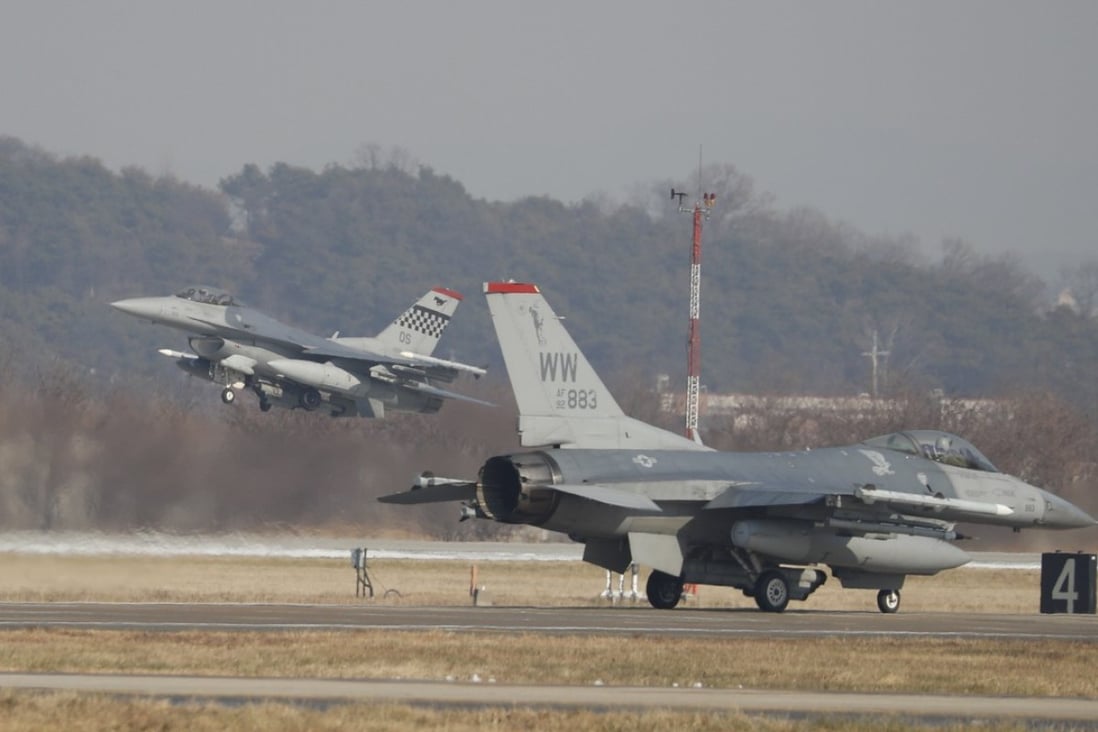 US Air Force F-16 fighter jets take part in a joint aerial drills called 'Vigilant Ace' between the US and South Korea at the Osan Air Base in Pyeongtaek on December 6, 2017. Photo: AFP
