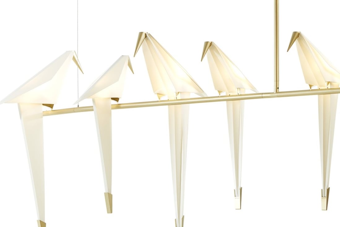 Moooi. The Perch Light Branch lamps, created by London-based architect-designer Umut Yamac, are in synthetic paper, brass and steel, creating a spring vibe. Price on request