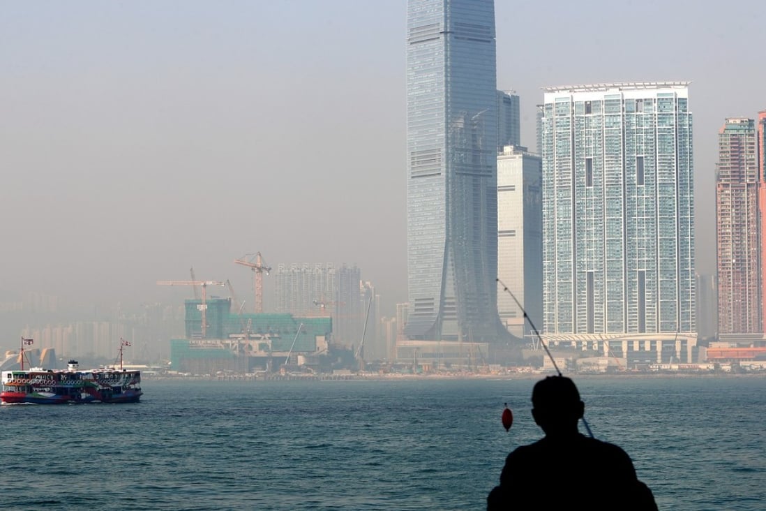 A view of Victoria Harbour from Central as air pollution blankets multiple areas of Hong Kong in mid-January, on a day when 14 of the 16 air quality monitoring stations showed a “high” to “very high” health risk in the early afternoon. Photo: Winson Wong